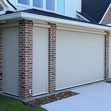 Elegant-Motorized-Outdoor-Roller-Shade-w-Track-System-on-Bending-Stream-Dr-in-League-City-TX 0
