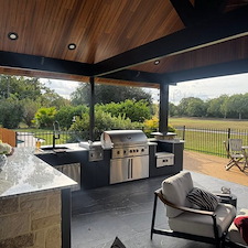 Gorgeous-Outdoor-Roller-Shades-over-Outdoor-Kitchen-on-Seaborough-Ln-in-League-City-TX 1