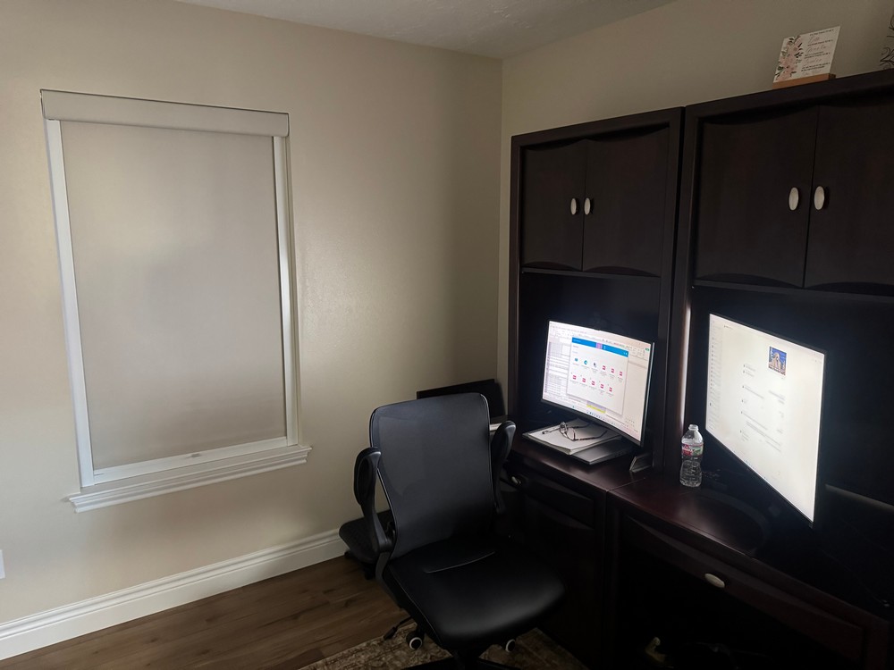 Smooth Room Darkening Shades with Norman LG 360 Tracks on 4th St in Santa Fe, TX